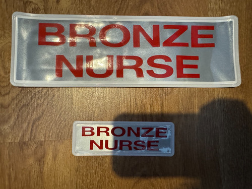 Bronze nurse reflective - "bronze, nurse"